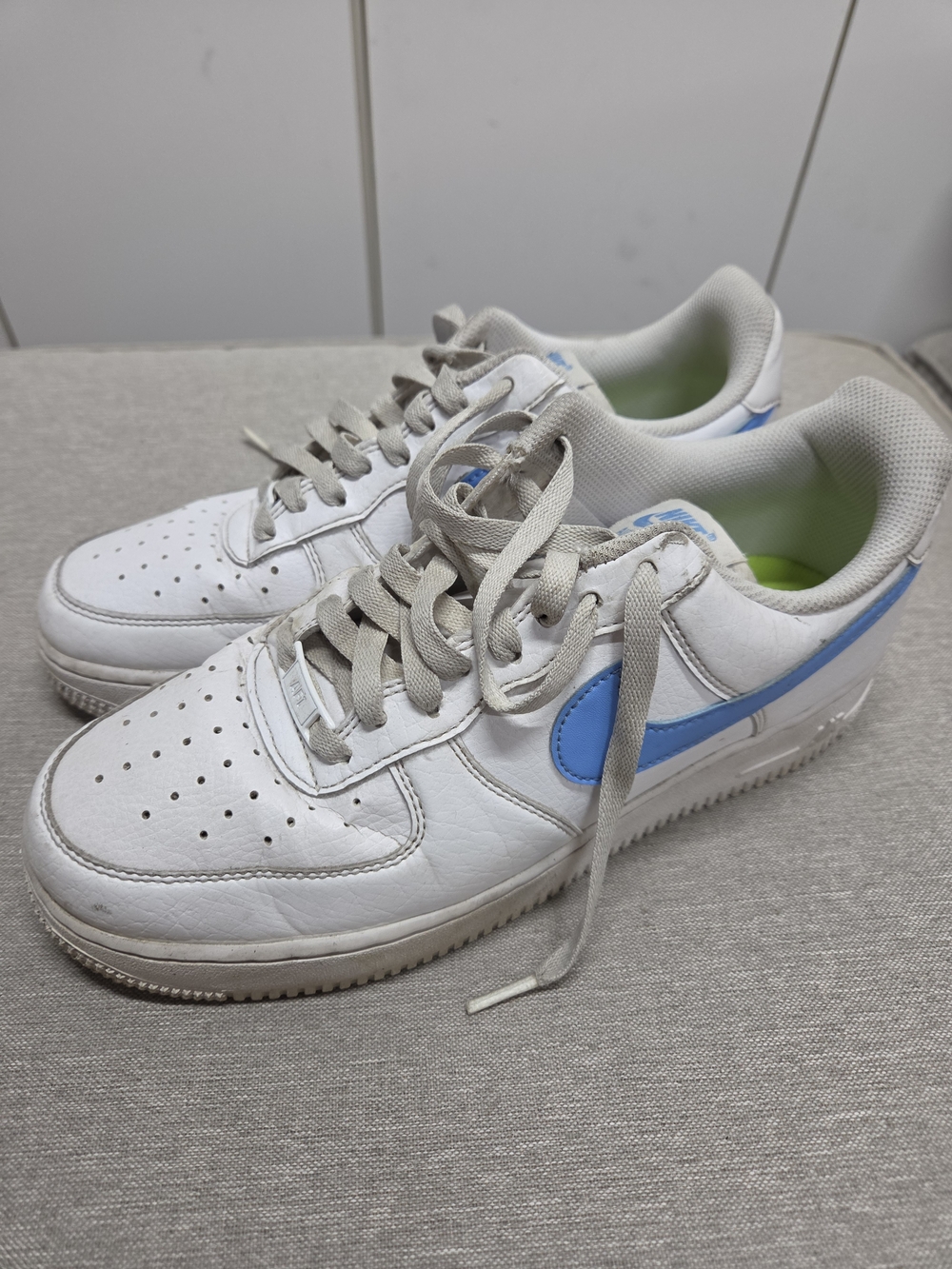 Nike Air Force 1 White Sneakers with Light Blue Swoosh